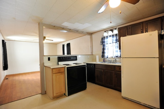 kitchen with sink, dishwasher, white fridge, range with electric cooktop, and ceiling fan