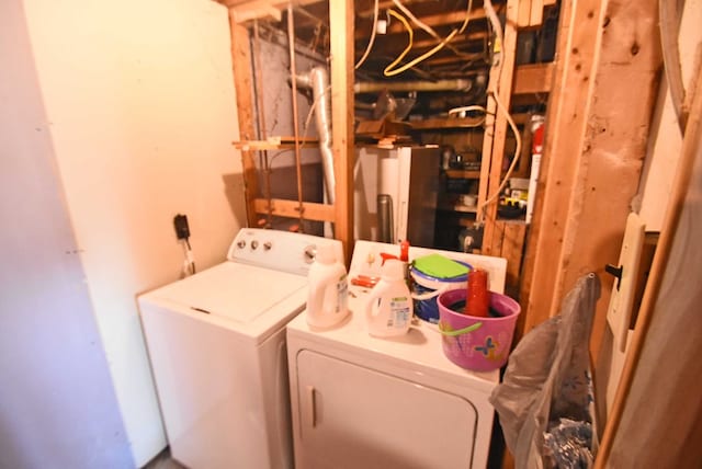 laundry room with separate washer and dryer