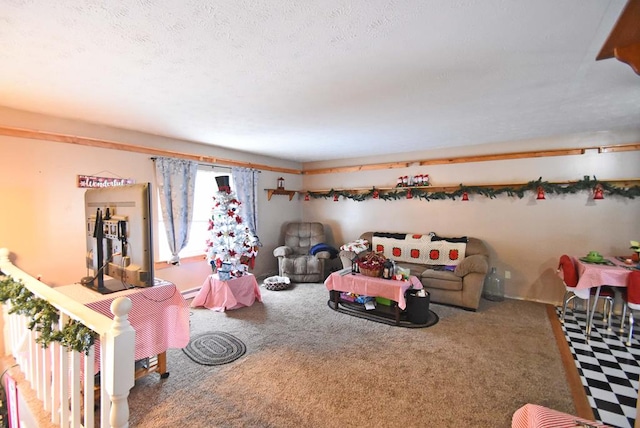 living room featuring carpet and a textured ceiling