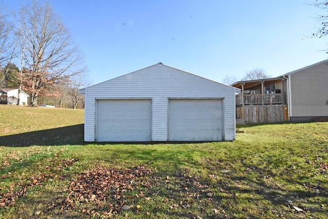 garage with a yard