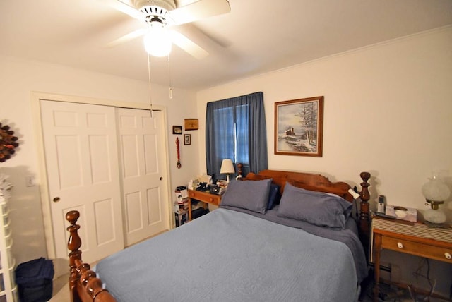 bedroom featuring ceiling fan and a closet