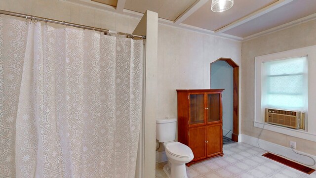 bathroom featuring cooling unit and toilet