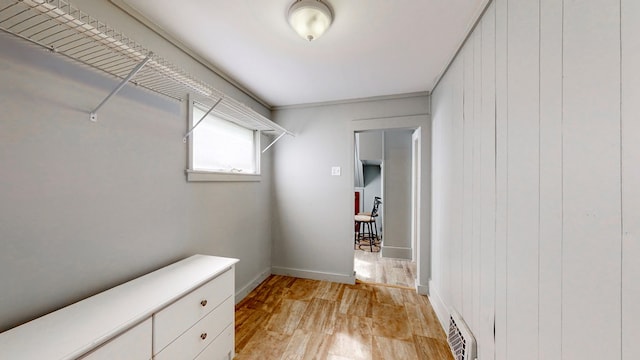 walk in closet featuring light wood-type flooring