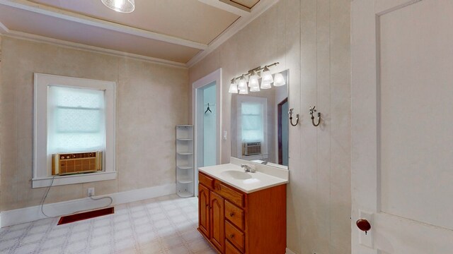 bathroom featuring crown molding and vanity