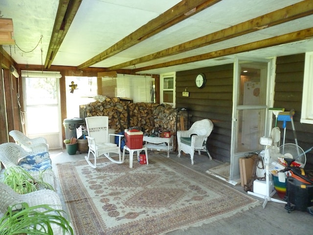 sunroom / solarium with beamed ceiling