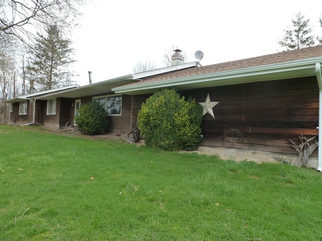 exterior space featuring a lawn