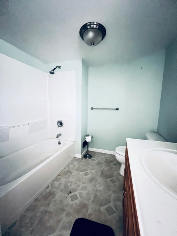 full bathroom with vanity, bathtub / shower combination, and toilet