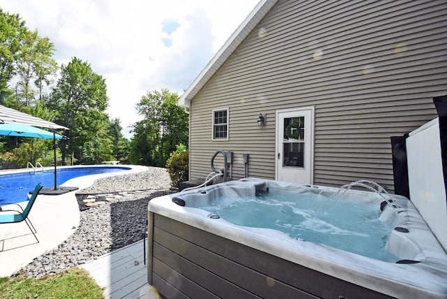 view of patio with a hot tub