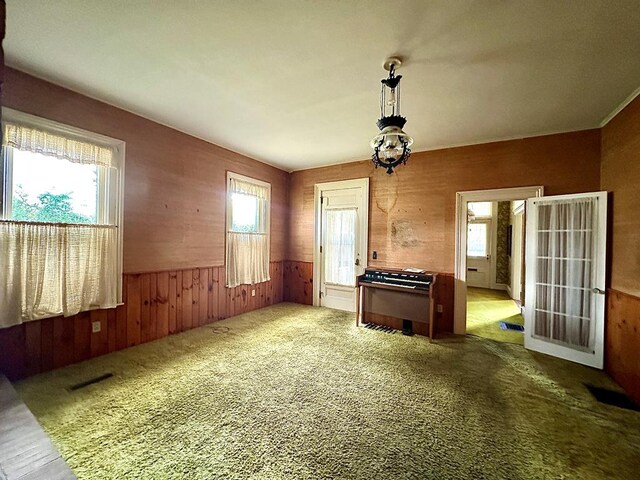 interior space featuring wooden walls