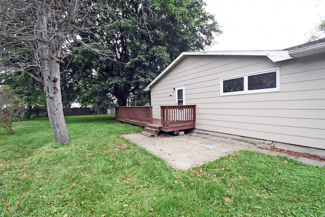 view of yard with a patio and a deck