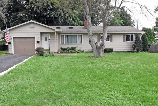 single story home with a garage and a front yard