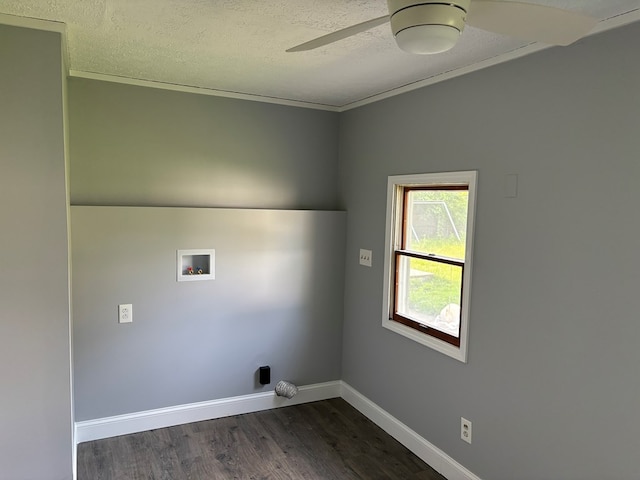 clothes washing area featuring dark hardwood / wood-style floors, ornamental molding, ceiling fan, hookup for a washing machine, and a textured ceiling