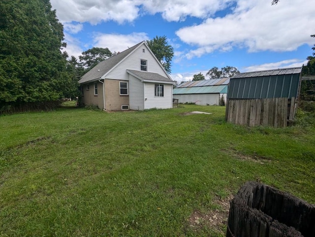 exterior space featuring a shed