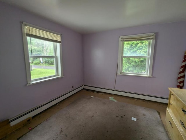 unfurnished room featuring plenty of natural light