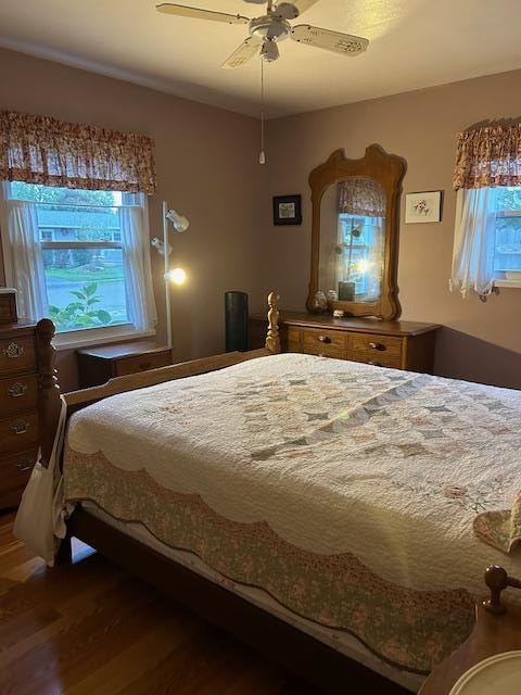 bedroom featuring wood-type flooring and ceiling fan