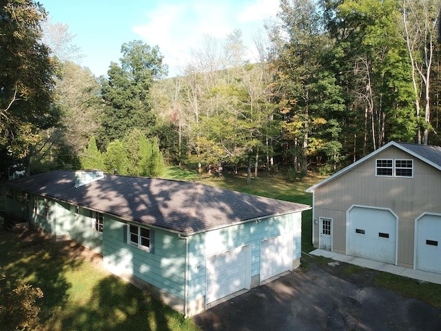 garage with a yard