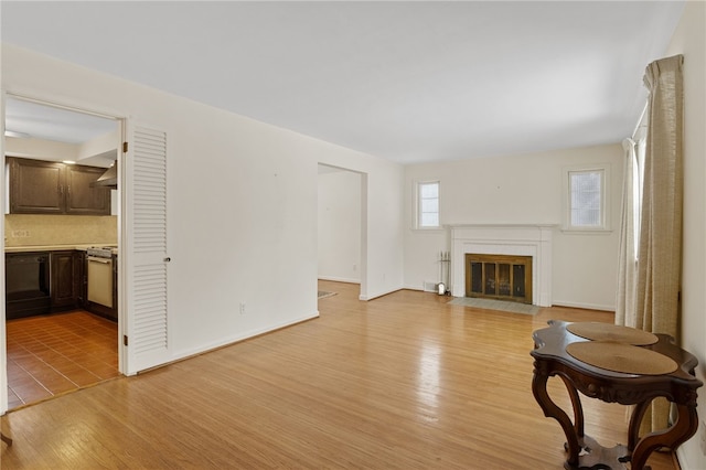 living room with light hardwood / wood-style flooring