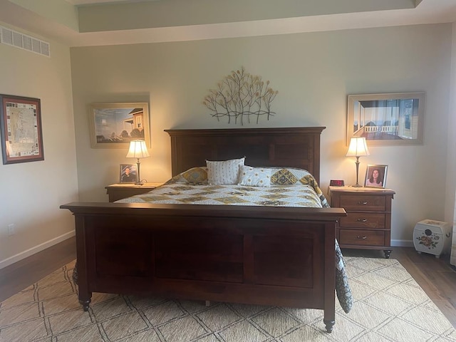 bedroom with light wood-type flooring