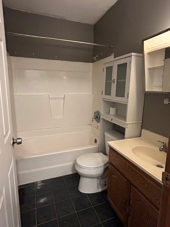 full bathroom with vanity, tile patterned floors, shower / bathtub combination, and toilet