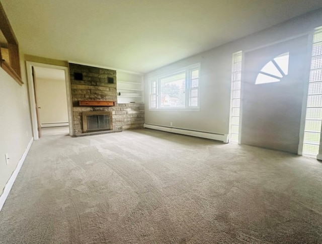 unfurnished living room featuring a stone fireplace, carpet floors, built in features, and baseboard heating