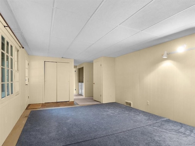 empty room with light colored carpet