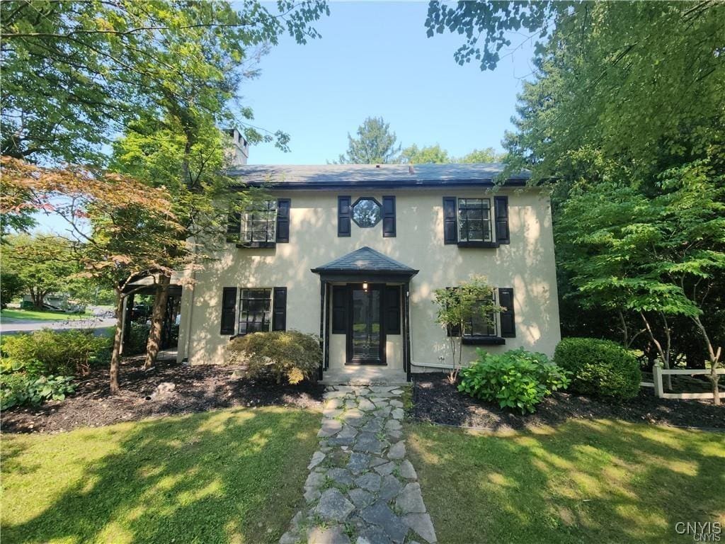 colonial house with a front lawn