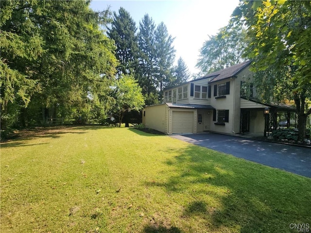 view of yard with a garage