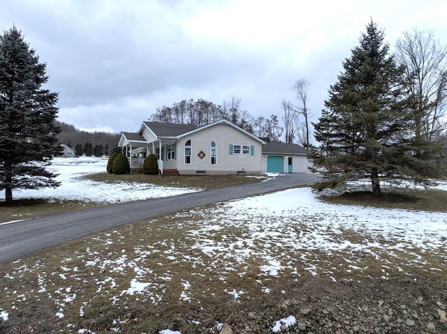 view of snow covered property