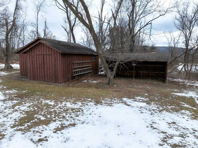 exterior space with an outbuilding