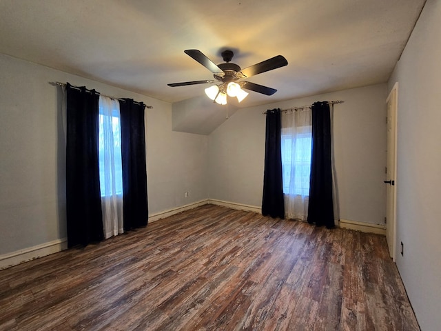 unfurnished room with dark wood-type flooring and ceiling fan