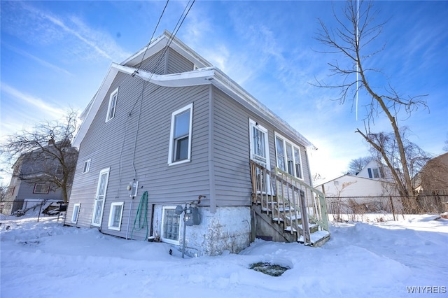 view of snow covered property