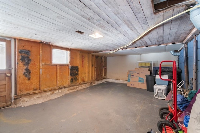 basement featuring wood ceiling