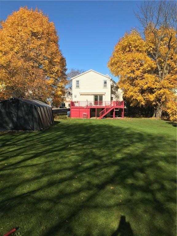 view of yard featuring a deck