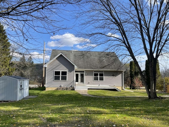 back of property with a shed and a lawn