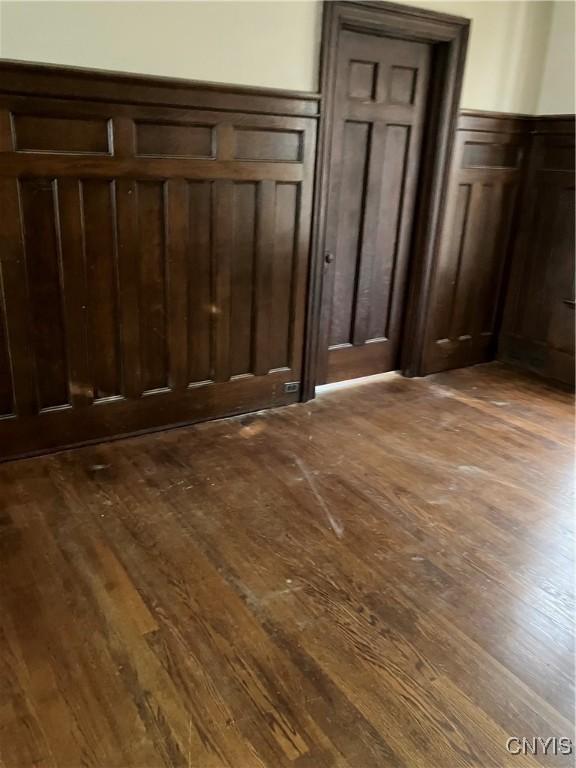 interior space with dark hardwood / wood-style flooring