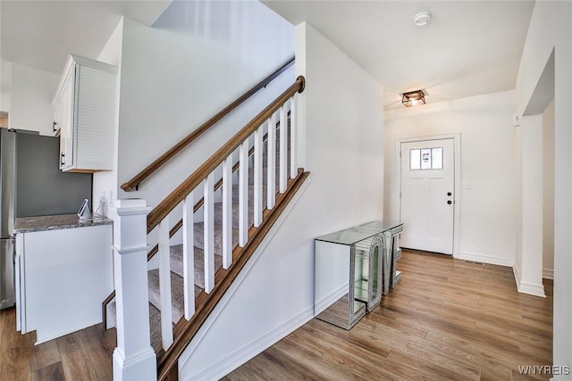 foyer entrance featuring light hardwood / wood-style flooring