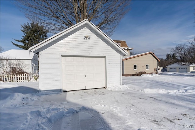 view of snow covered garage