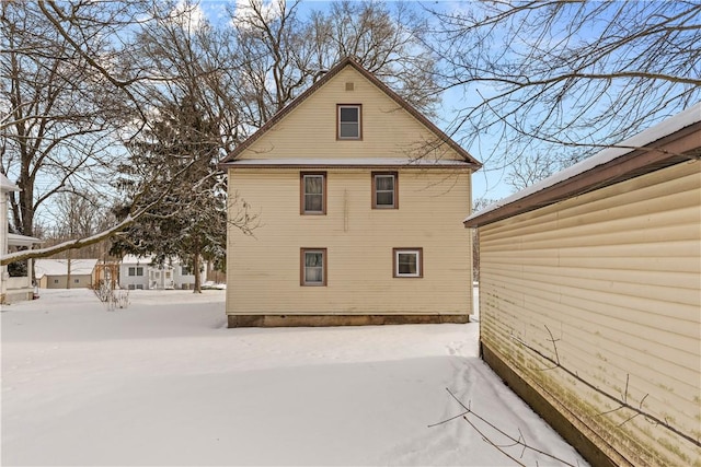 view of snow covered property