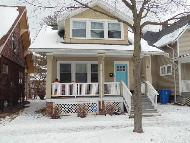 view of front of property featuring covered porch