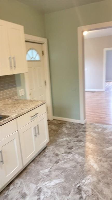 kitchen with white cabinetry