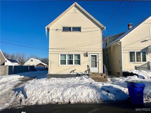 view of snow covered house