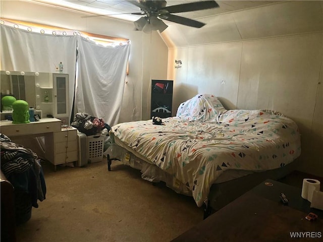 bedroom featuring lofted ceiling, carpet floors, and ceiling fan