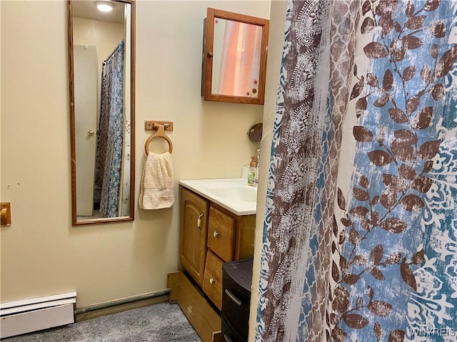 bathroom featuring vanity and a baseboard radiator