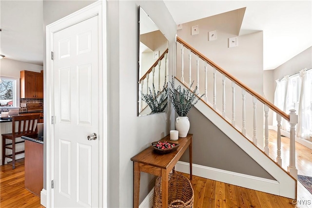 staircase featuring hardwood / wood-style floors