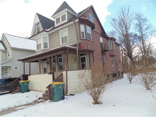 victorian-style house with covered porch