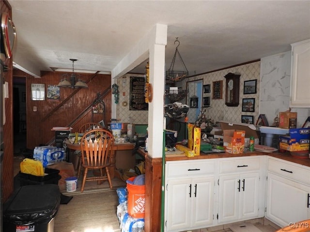 kitchen featuring white cabinets