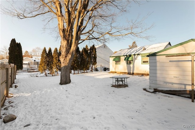 view of yard covered in snow