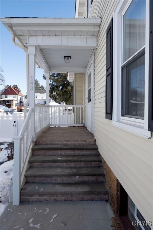 view of snow covered deck