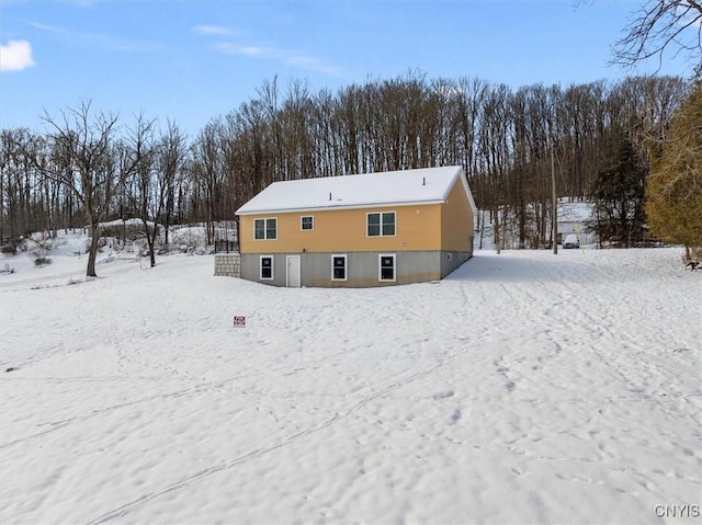 view of snow covered property