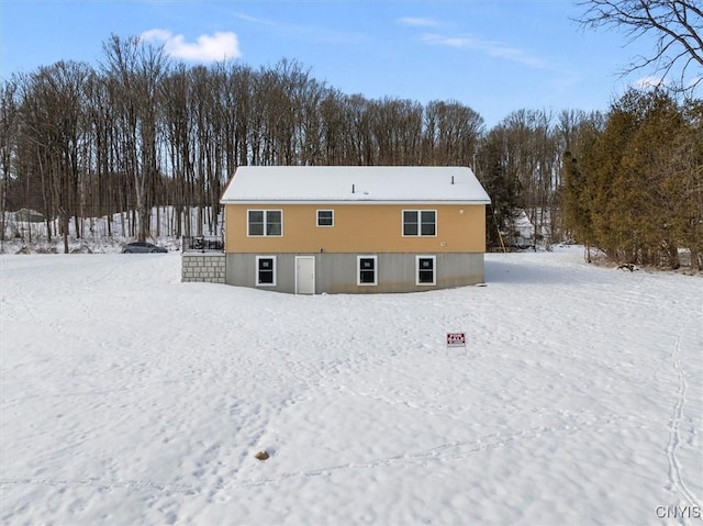 view of snow covered property